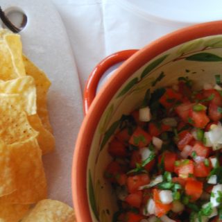 This fresh salsa recipe will be a hit at your superbowl party! Make your pico de gallo as hot as you dare and heat up your superbowl menu! Find more recipes at accidentallycrunchy.com